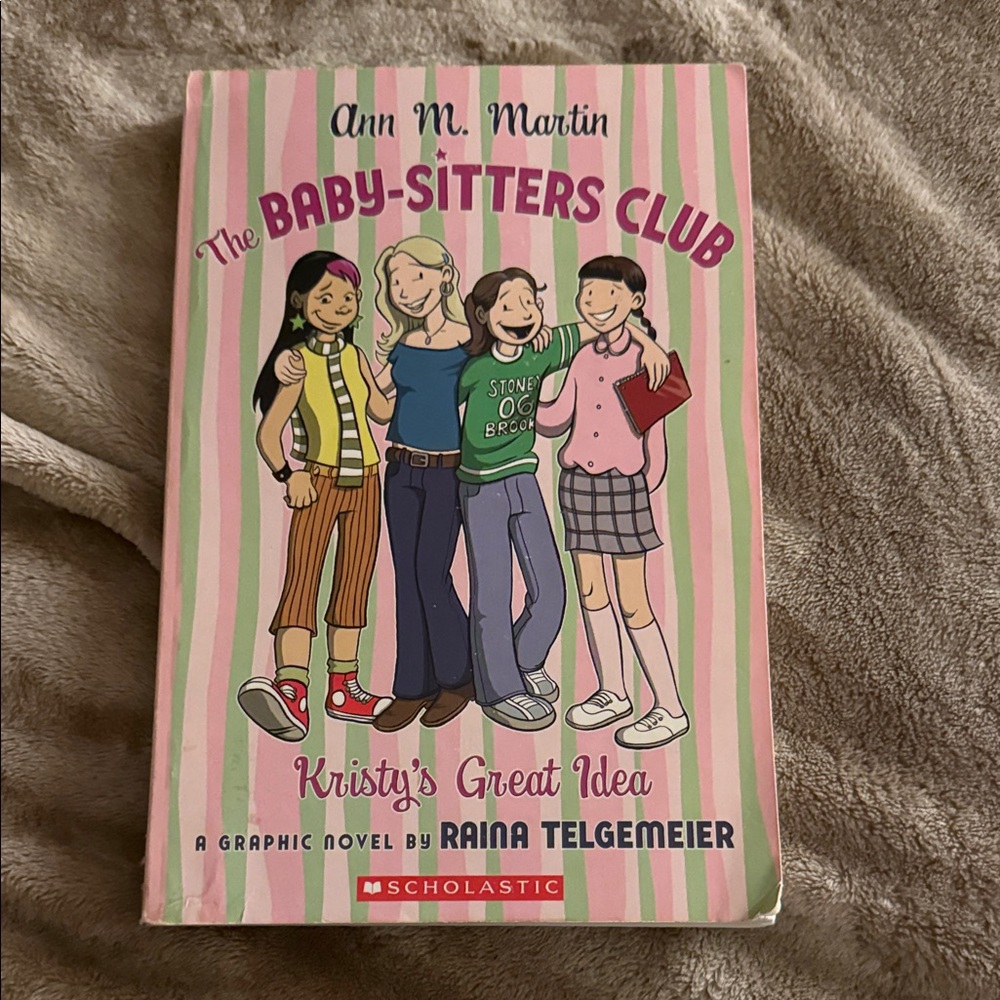 Scholastic Graphic Novel with Pink and Green Cover